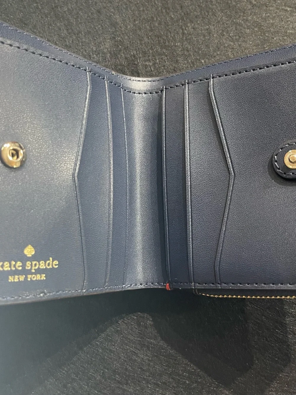 kate spade Red and Cream Zip-Around Compact Wallet